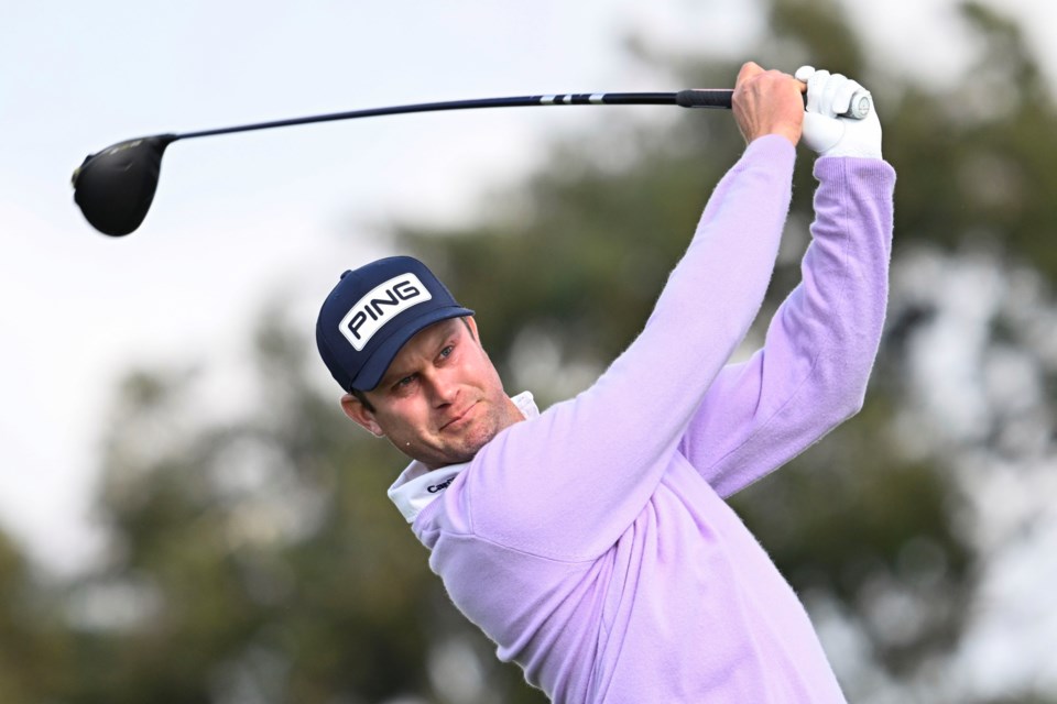 Harris English hits his tee shot on the second hole on the South Course at Torrey Pines during the final round of the Farmers Insurance Open golf tournament Saturday, Jan. 25, 2025, in San Diego. (AP Photo/Denis Poroy)