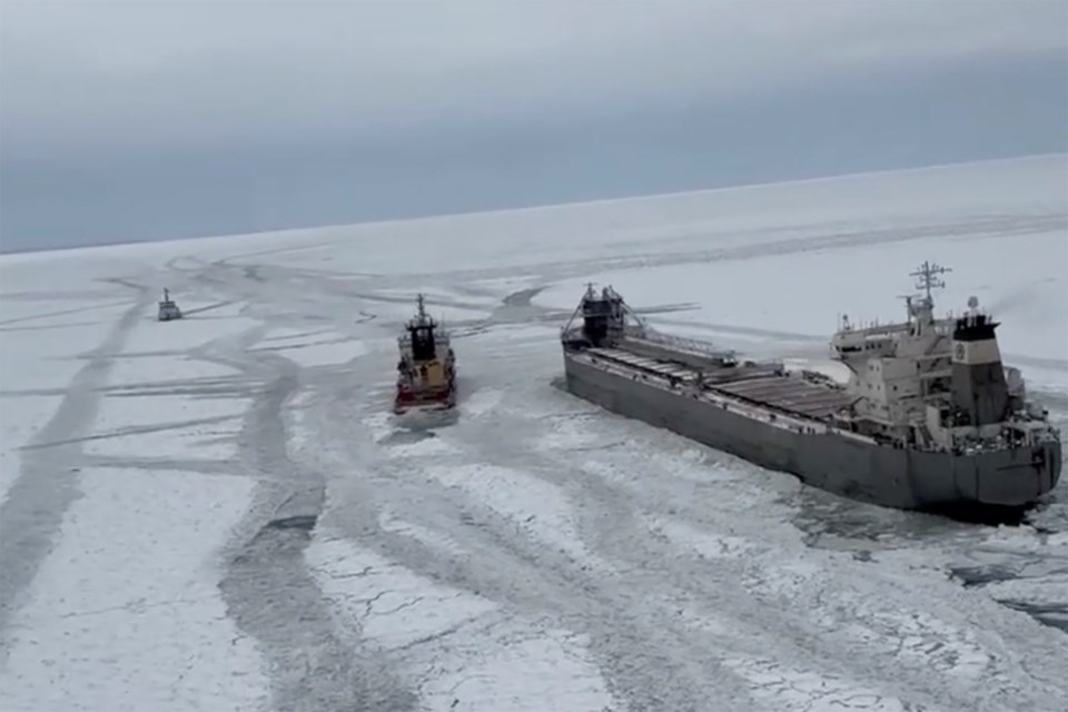 U.S. Coast Guard Air Station Detroit deploys a helicopter crew to conduct overflights of Canadian vessel Manitoulin trapped in a frozen Lake Erie on Saturday, Jan. 25, 2025 in Buffalo, N.Y. (U.S. Coast Guard Air Station Detroit via AP)