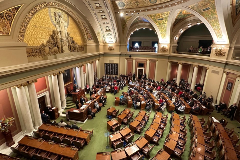 Roughly half of the Minnesota House seats remain empty as Democrats fail to show up after the legislative session gaveled in on Tuesday, Jan. 14, 2025, in St. Paul, Minnesota. (AP Photo/Mark Vancleave)