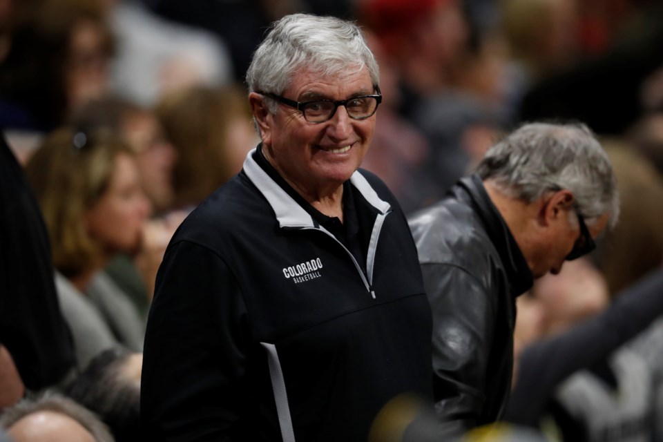 FILE - Retired Colorado head football coach Bill McCartney watches in the second half of an NCAA college basketball game, March 9, 2019, in Boulder, Colo. (AP Photo/David Zalubowski, File)