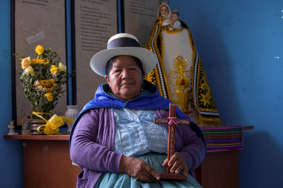 Lidia Flores, the leader of the National Association of Relatives of Detained and Disappeared Persons of Peru, poses for a portrait in Ayacucho, Peru, Tuesday, Oct. 22, 2024. Flores' husband was killed in Peru's internal armed conflict (1980-2000). (AP Photo/Silvio La Rosa)