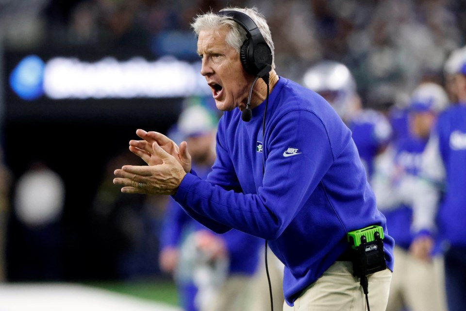 FILE - Seattle Seahawks head coach Pete Carroll watches play in the first half of an NFL football game against the Dallas Cowboys in Arlington, Texas, Thursday, Nov. 30, 2023. (AP Photo/Michael Ainsworth, File)