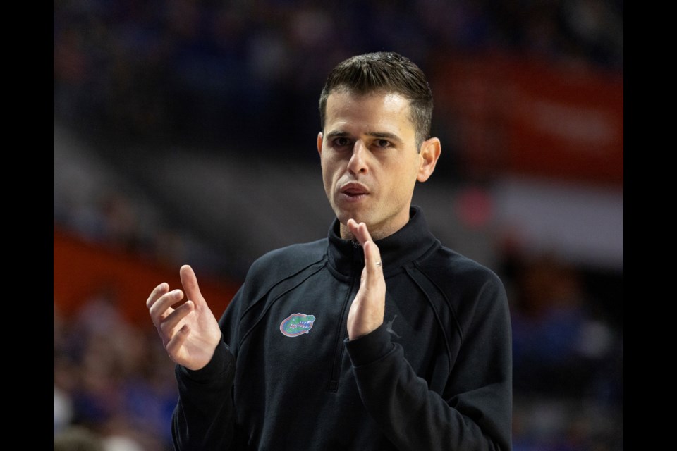 Florida head coach Todd Golden reacts during the first half of an NCAA college basketball game against Texas, Saturday, Jan. 18, 2025, in Gainesville, Fla. (AP Photo/Alan Youngblood)