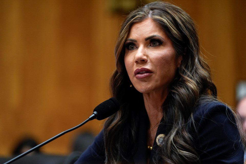 South Dakota Gov. Kristi Noem, President-elect Donald Trump's nominee to be Secretary of Homeland Security, appears before the Senate Homeland Security and Governmental Affairs Committee for her confirmation hearing, at the Capitol in Washington, Friday, Jan. 17, 2025. (AP Photo/Susan Walsh)