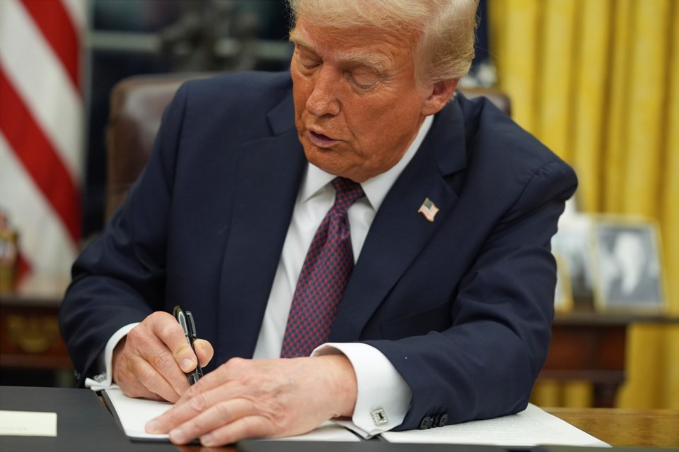 President Donald Trump signs an executive order on birthright citizenship in the Oval Office of the White House, Monday, Jan. 20, 2025, in Washington. (AP Photo/Evan Vucci)