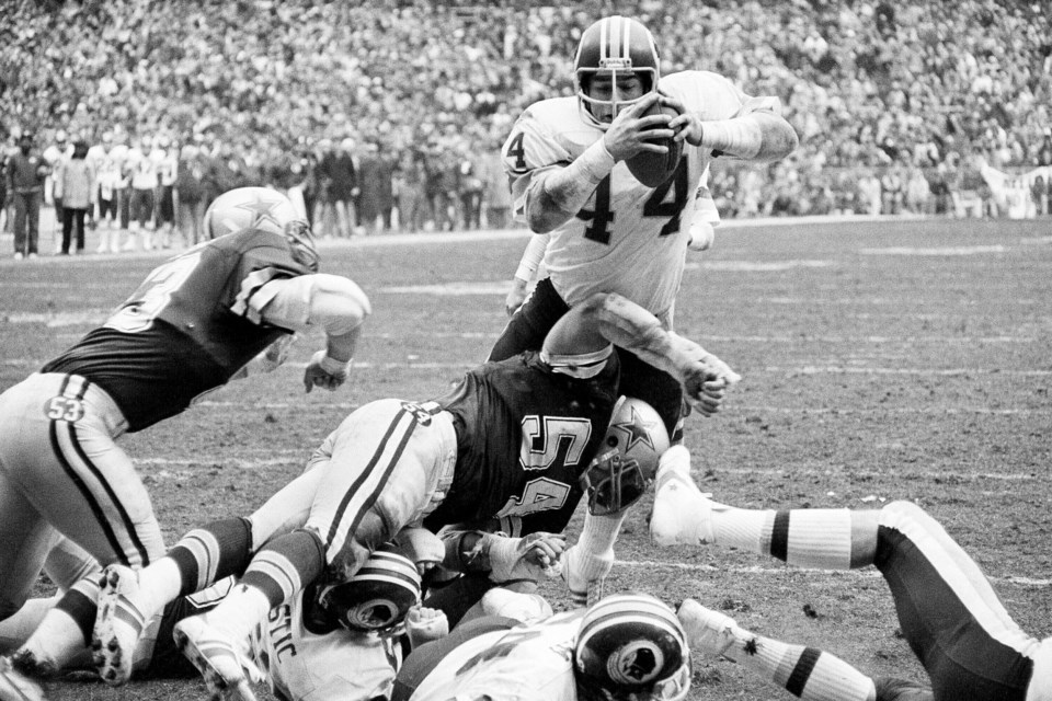 FILE - Washington Redskins's John Riggins (44) heads for the end zone for the team's second touchdown in the NFC Championship NFL football game against the Dallas Cowboys in Washington, Jan. 22, 1983. (AP Photo/File)