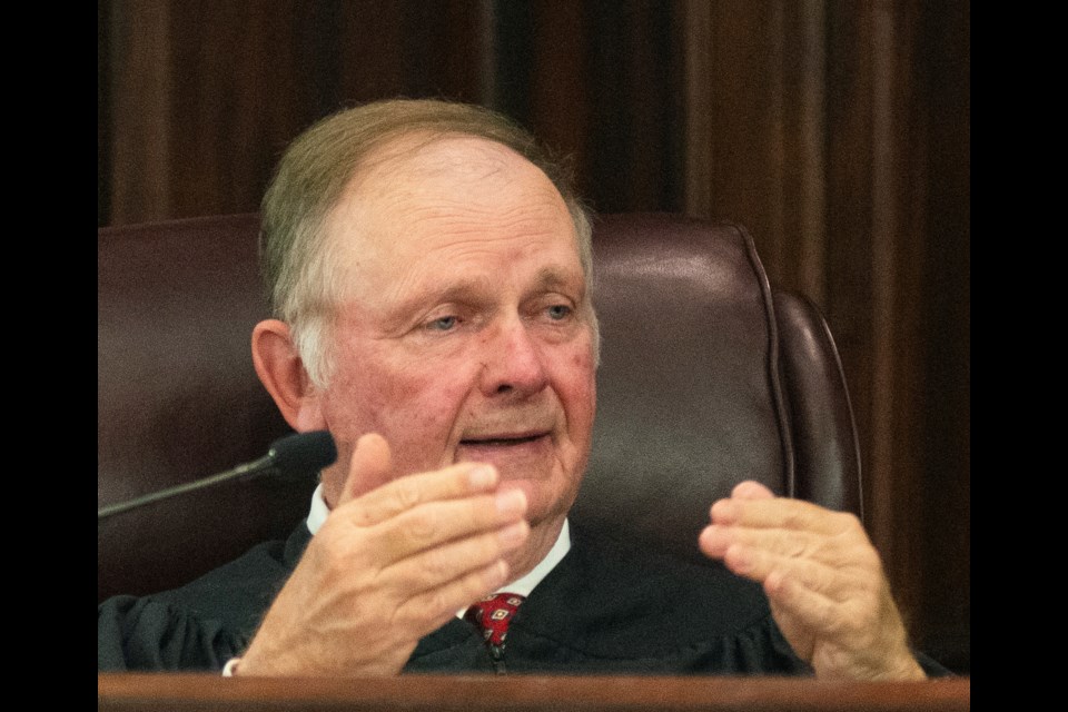 Senior Judge John R. Tuner addresses the jury Tuesday, Jan. 28, 2025, in Brunswick, Ga., moments before lawyers delivered their opening statements in the trial of former Brunswick Judicial Circuit District Attorney Jackie Johnson who is accused of obstruction of justice and violating her oath of office. (Terry Dickson/The Brunswick News via AP, Pool)