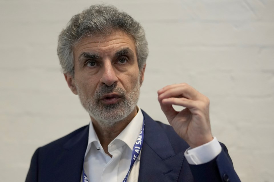 FILE - Yoshua Bengio, Scientific Director Mila Quebec AI Institute, speaks to the Associated Press during the AI Safety Summit in Bletchley Park, Milton Keynes, England, Wednesday, Nov. 1, 2023. (AP Photo/Alastair Grant, File)