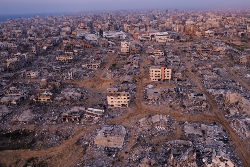 Buildings that were destroyed by the Israeli air and ground offensive are seen at the Tel al-Hawa neighbourhood in Gaza Strip, Tuesday, Jan. 28, 2025. (AP Photo/Mohamamd Abu Samra)