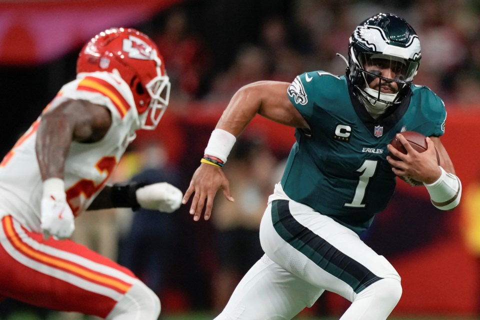 Philadelphia Eagles quarterback Jalen Hurts (1) runs during the first half of the NFL Super Bowl 59 football game against the Kansas City Chiefs, Sunday, Feb. 9, 2025, in New Orleans. (AP Photo/Matt Slocum)