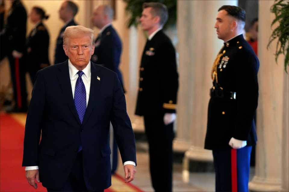 President Donald Trump arrives to sign the Laken Riley Act in the East Room of the White House, Wednesday, Jan. 29, 2025, in Washington. (AP Photo/Evan Vucci)