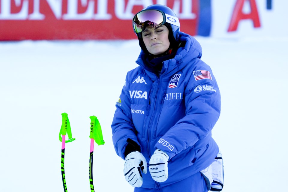 United States' Lindsey Vonn goes through the course in her mind ahead of a women's Super-G, at the Alpine Ski World Championships, in Saalbach-Hinterglemm, Austria, Thursday, Feb. 6, 2025. (AP Photo/Giovanni Auletta)