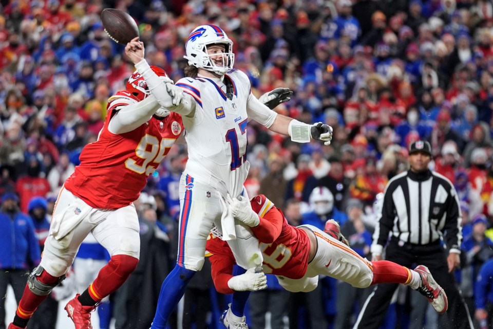 Kansas City Chiefs defensive tackle Chris Jones (95) hits Buffalo Bills quarterback Josh Allen (17) causing a fumble during the second half of the AFC Championship NFL football game, Sunday, Jan. 26, 2025, in Kansas City, Mo. (AP Photo/Ashley Landis)