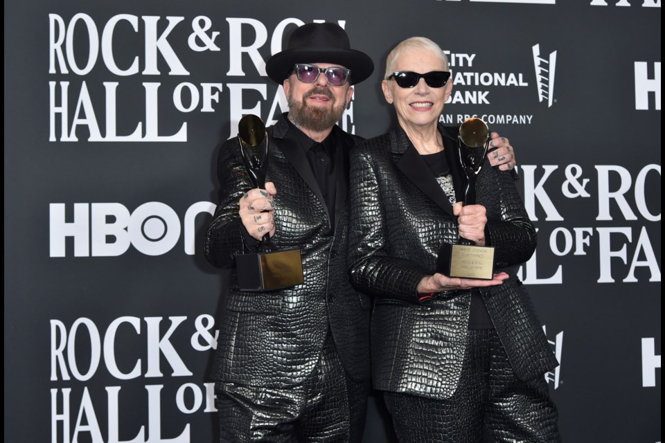 Inductees Dave Stewart, left, and Annie Lennox of Eurythmics pose in the press room during the Rock & Roll Hall of Fame Induction Ceremony on, Nov. 5, 2022, at the Microsoft Theater in Los Angeles. (Photo by Richard Shotwell/Invision/AP)