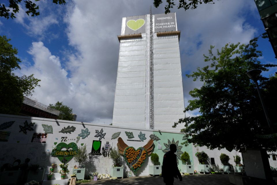 The Grenfell Tower and memorial wall on the seventh anniversary of the fire, in North Kensington, London, June 14, 2024. (AP Photo/Kirsty Wigglesworth, File)