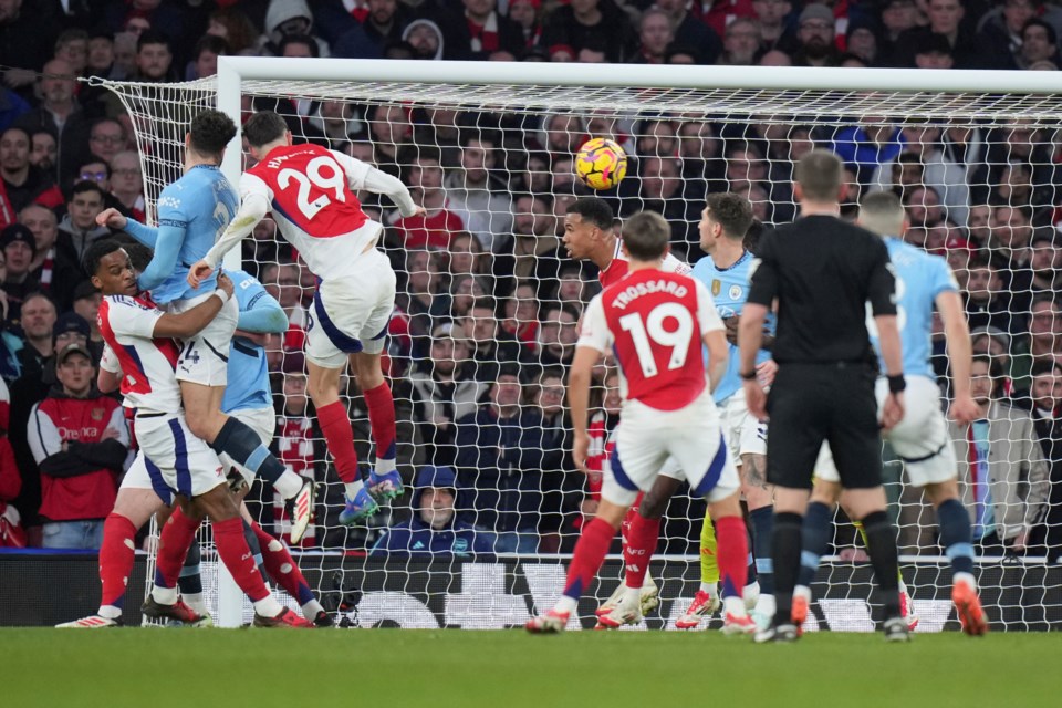 Manchester City's Josko Gvardiol, second from left, fails a chance to score during the English Premier League soccer match between Arsenal and Manchester City at the Emirates stadium in London, Sunday, Feb. 2, 2025. (AP Photo/Alastair Grant)