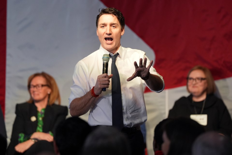 Prime Minister Justin Trudeau addresses a Canada-U.S. economic summit in Toronto, Friday, Feb. 7, 2025. (Frank Gunn /The Canadian Press via AP)