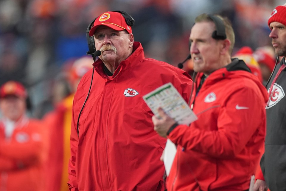 Kansas City Chiefs head coach Andy Reid watches from the sidelines alongside defensive coordinator Steve Spagnuolo, right, during the second half of an NFL football game against the Denver Broncos Sunday, Jan. 5, 2025, in Denver. (AP Photo/David Zalubowski)