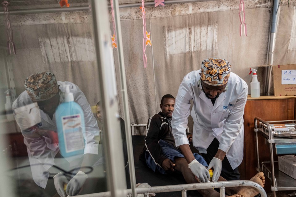 Medics treat a man wounded during fighting between Congolese government troops and M23 rebel forces in Goma's Kyeshero hospital Saturday, Feb. 1, 2025. (AP Photo/Moses Sawasawa)