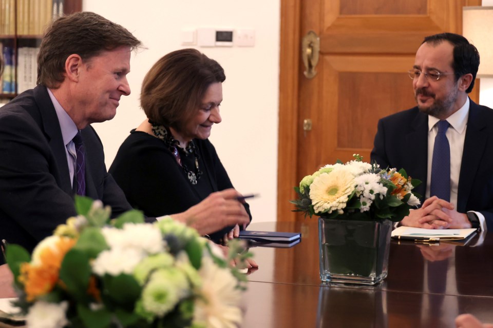 U.N. Under-Secretary-General for Political and Peacebuilding Affairs Rosemary DiCarlo, center, U.N. Secretary General's Special Representative in Cyprus Colin Stewart, left, and the Cyprus' President Nikos Christodoulides, right, talk during their meeting at the presidential palace in divided capital Nicosia, Cyprus, Monday, Feb. 10, 2025. (AP Photo/Petros Karadjias)