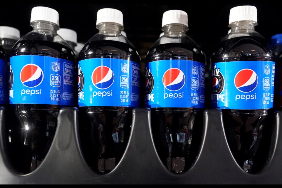 FILE - Pepsi soda bottles are on display for sale Friday, Feb. 5, 2021, in Dallas. (AP Photo/LM Otero)