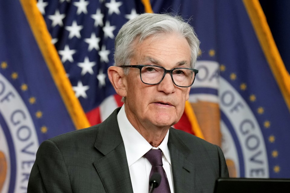 Fed hold rates steady, sees inflation as 'elevated,' as Powell declines