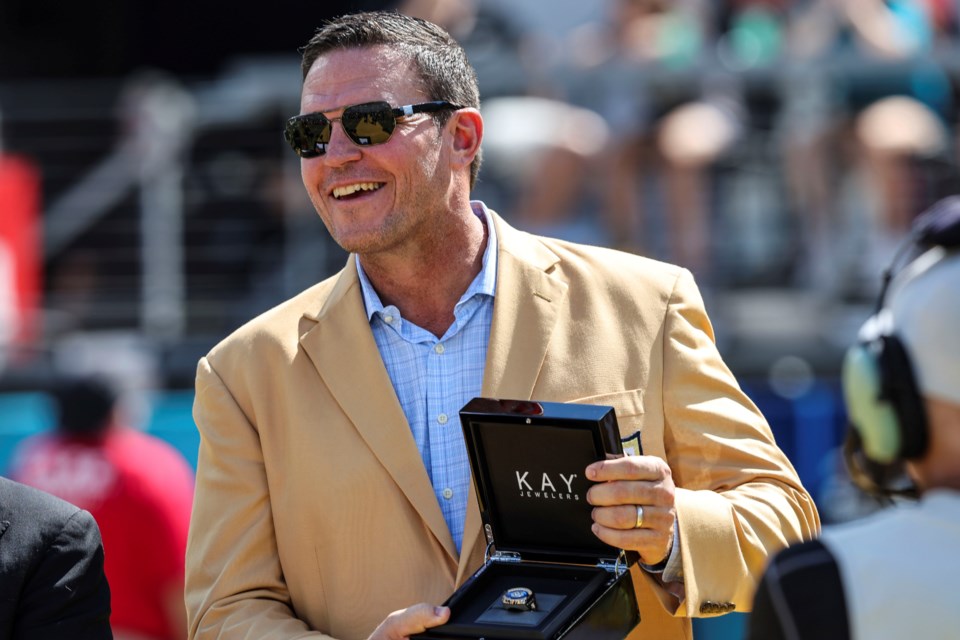 FILE - Tony Boselli receives his Pro Football Hall of Fame ring during halftime of an NFL football game between the Jacksonville Jaguars and the Houston Texans on Sunday, Oct. 9, 2022, in Jacksonville, Fla. (AP Photo/Gary McCullough, File)