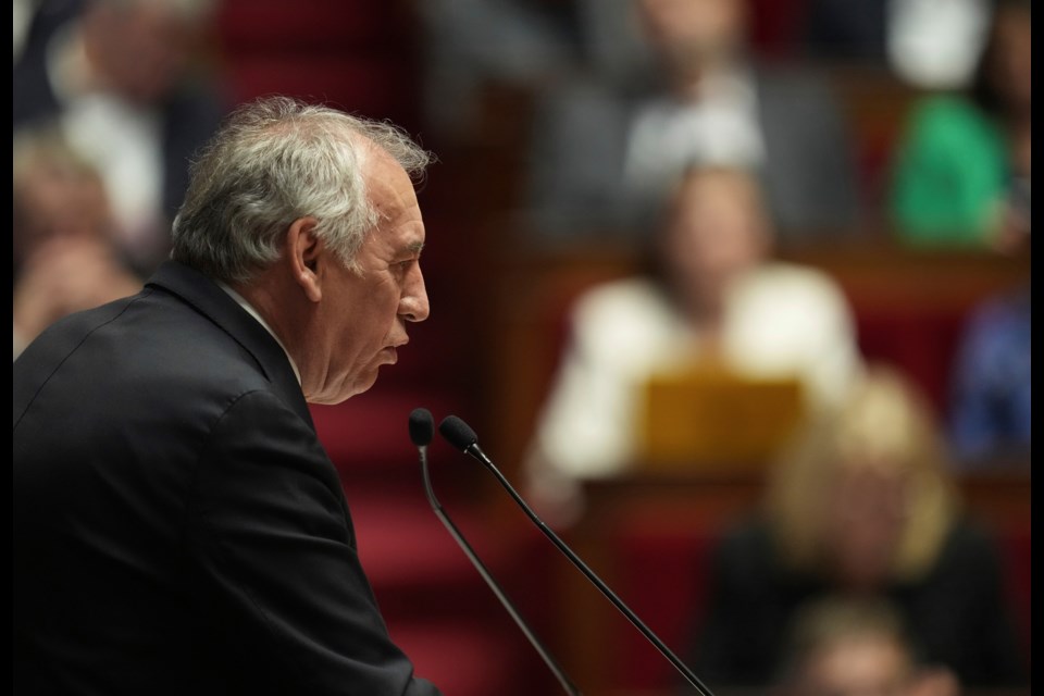 French Prime Minister Francois Bayrou delivers his general policy speech, Tuesday, Jan. 14, 2025 at the National Assembly in Paris. (AP Photo/Thibault Camus)