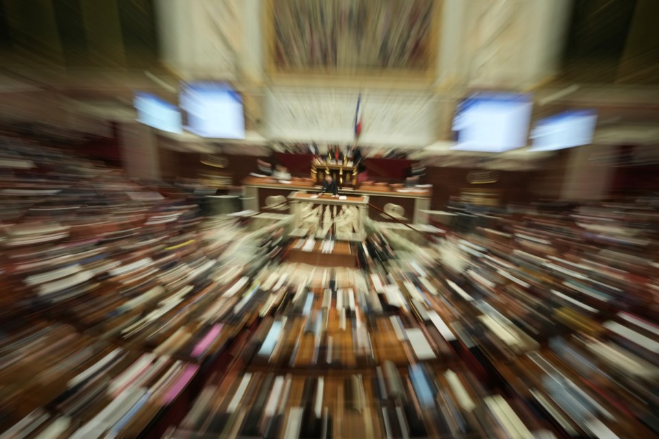 Lawmakers listen to French Prime Minister Francois Bayrou delivering his general policy speech, Tuesday, Jan. 14, 2025 at the National Assembly in Paris. (AP Photo/Thibault Camus)