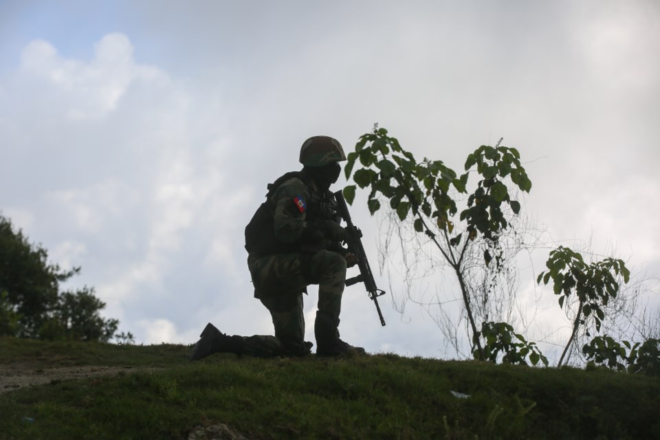 A soldier carries out an anti-gang operation in the Kenscoff neighborhood of Port-au-Prince, Haiti, Monday, Feb. 3, 2025. (AP Photo/Odelyn Joseph)