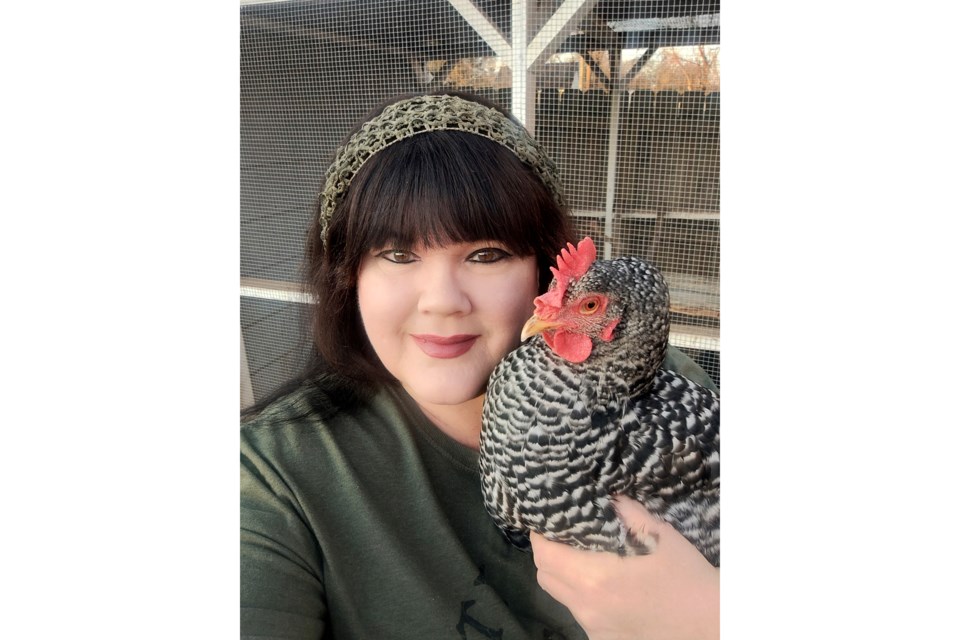 Sarah Penny holds Phoenix, one of the chickens she keeps in her yard in Knoxville, Tenn., on Jan. 29, 2025. (Sarah Penny via AP).