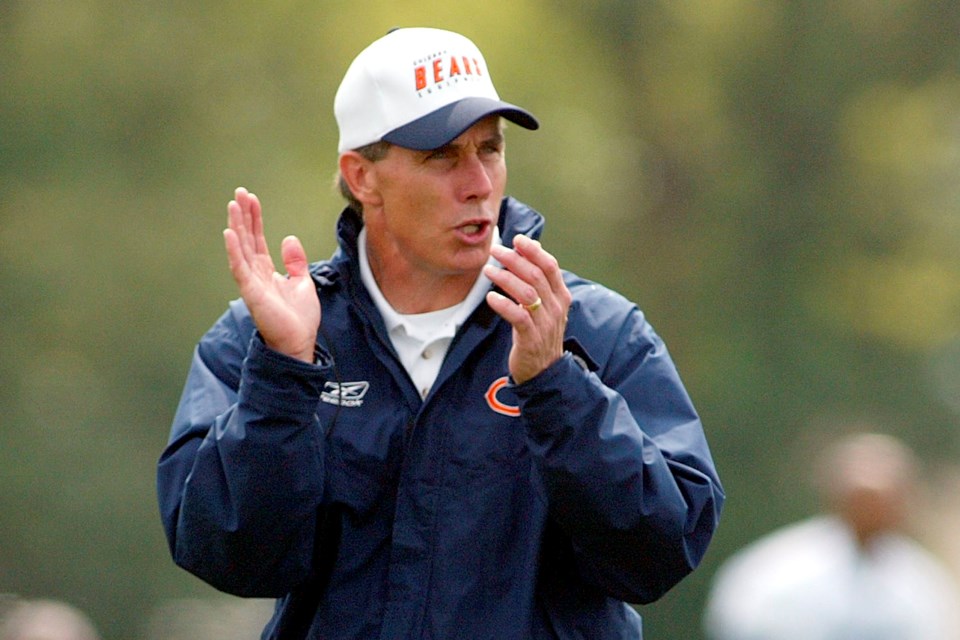 FILE - Chicago Bears coach Dick Jauron calls out to his team while observing offensive drills in morning training camp practice Saturday, July 27, 2002 at Olivet Nazarene University in Bourbonnais, Ill. (AP Photo/Ted S. Warren, File)