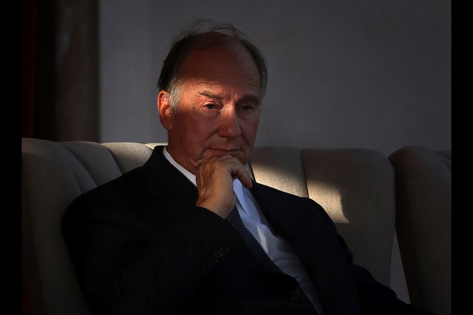 FILE - The Aga Khan, spiritual head of Ismaili Muslims, listens to a speech during the inauguration of the restored 16th century Humayun's Tomb in New Delhi, India, Sept. 18, 2013. (AP Photo/Manish Swarup, File)