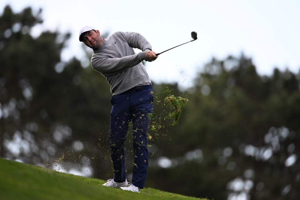 Scottie Scheffler hits from the 10th fairway at Spyglass Hill Golf Course during the first round of the AT&T Pebble Beach Pro-Am golf tournament, Thursday, Jan. 30, 2025, in Pebble Beach, Calif. (AP Photo/Nic Coury)