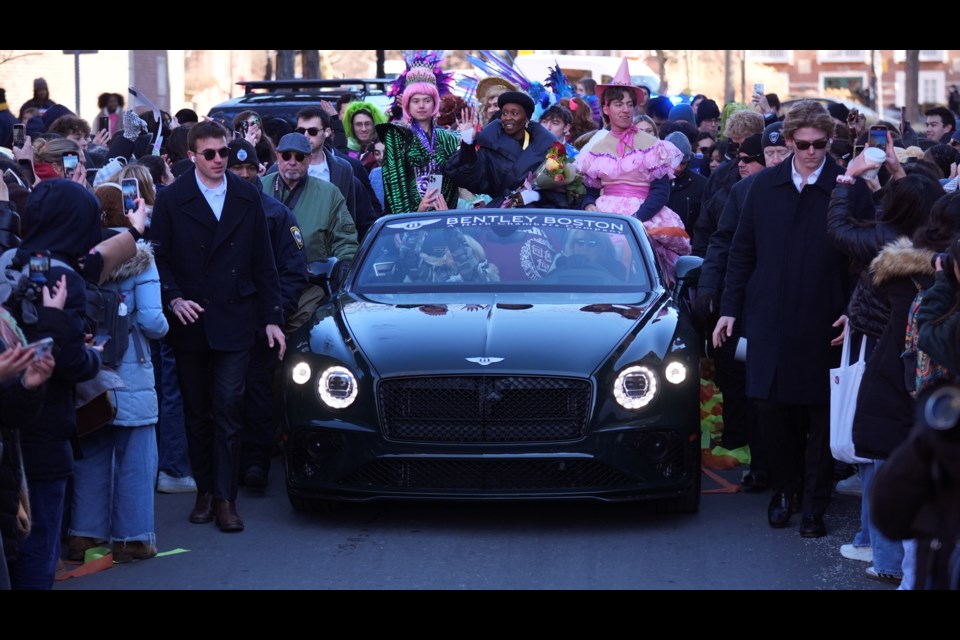 Harvard University's Hasty Pudding Theatricals Woman of the Year Cynthia Erivo rides with two character actors during a parade in her honor, Wednesday, Feb. 5, 2025, in Cambridge, Mass. (AP Photo/Charles Krupa)