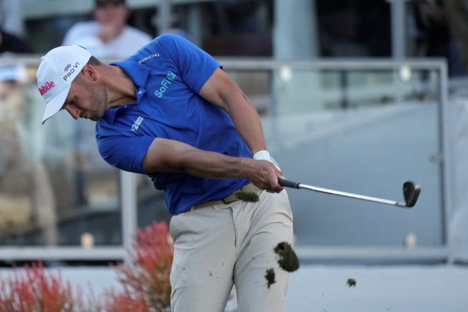 Wyndham Clark hits his tee shot at the 16th hole during the first round of the Waste Management Phoenix Open PGA Tour golf tournament at the TPC Scottsdale Thursday, Feb. 6, 2025, in Scottsdale, Ariz. (AP Photo/Ross D. Franklin)