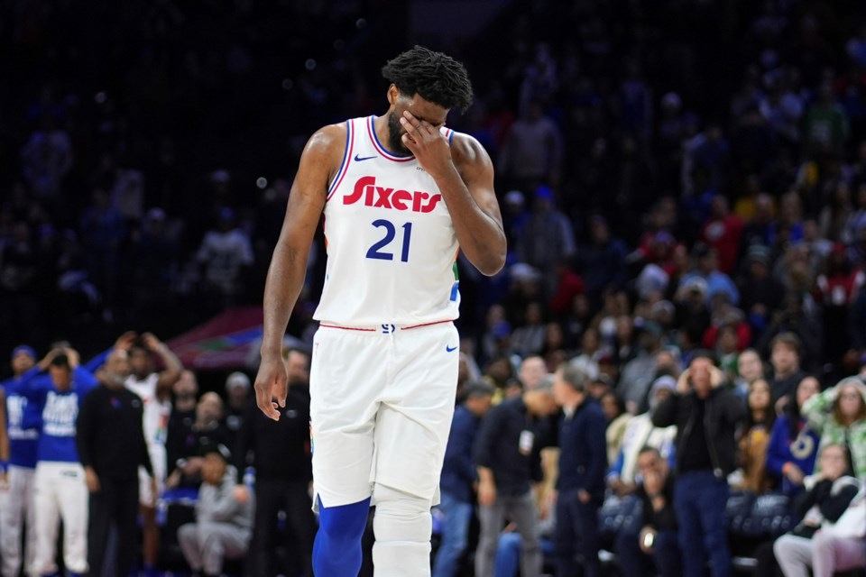 Philadelphia 76ers' Joel Embiid reacts after missing a shot during the second half of an NBA basketball game against the Toronto Raptors, Tuesday, Feb. 11, 2025, in Philadelphia. (AP Photo/Matt Slocum)