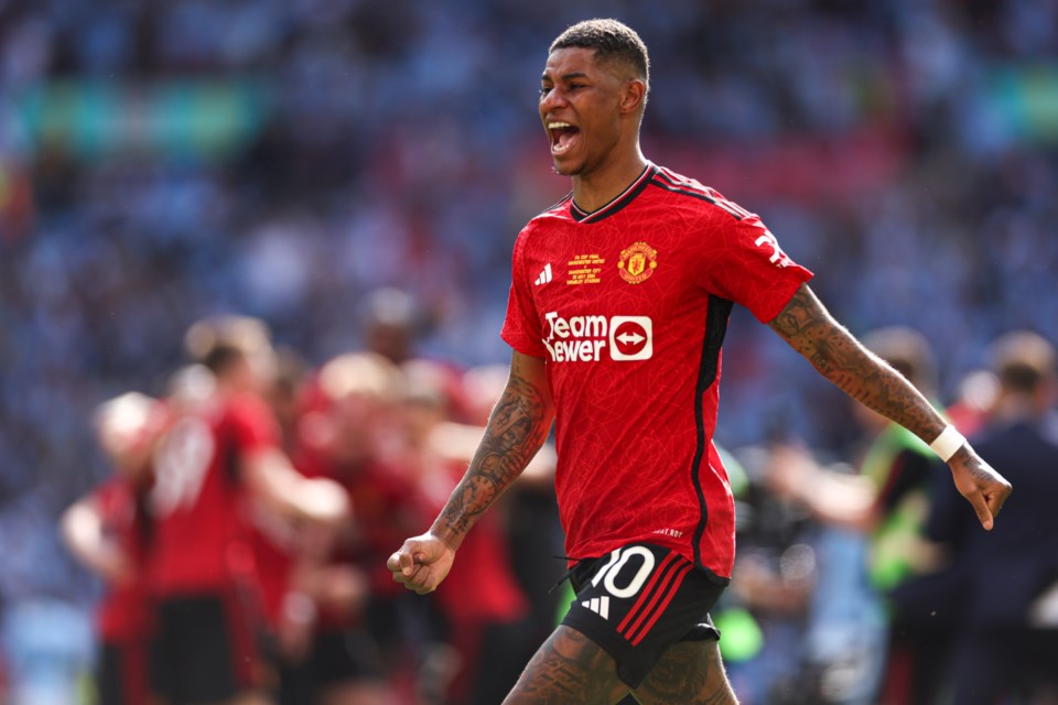 FILE - Manchester United's Marcus Rashford celebrates after his team won the English FA Cup final soccer match between Manchester City and Manchester United at Wembley Stadium in London, on May 25, 2024. (AP Photo/Ian Walton, File)