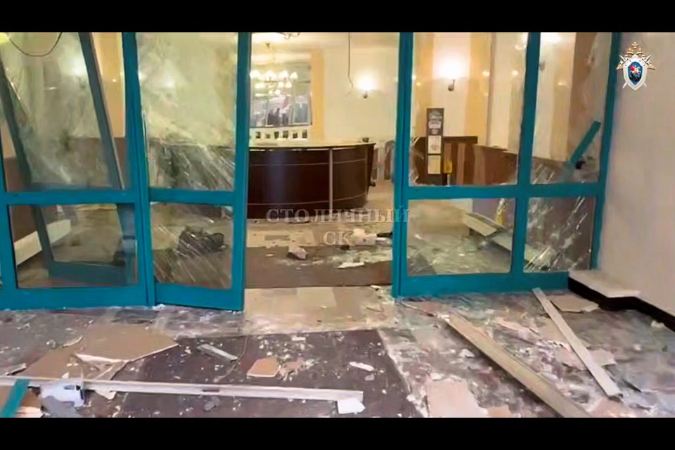 This handout photo taken from video released by Investigative Committee of Moscow on Monday, Feb. 3, 2025, shows the explosion site in an upscale residential block in Moscow, where the blast has killed one person and wounded four others, Russian news agencies say. (Investigative Committee of Moscow via AP)