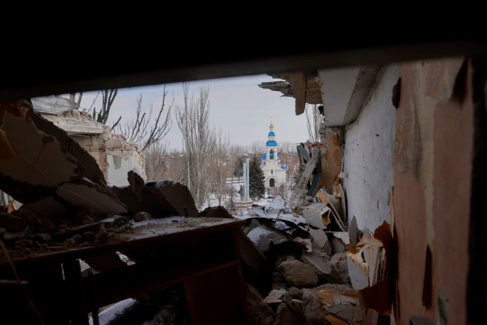 A damaged apartment building is seen after a Russian guided aircraft bomb attack in Kostiantynivka, Donetsk region, Ukraine, Monday, Feb. 24, 2025. (AP Photo/Yevhen Titov)