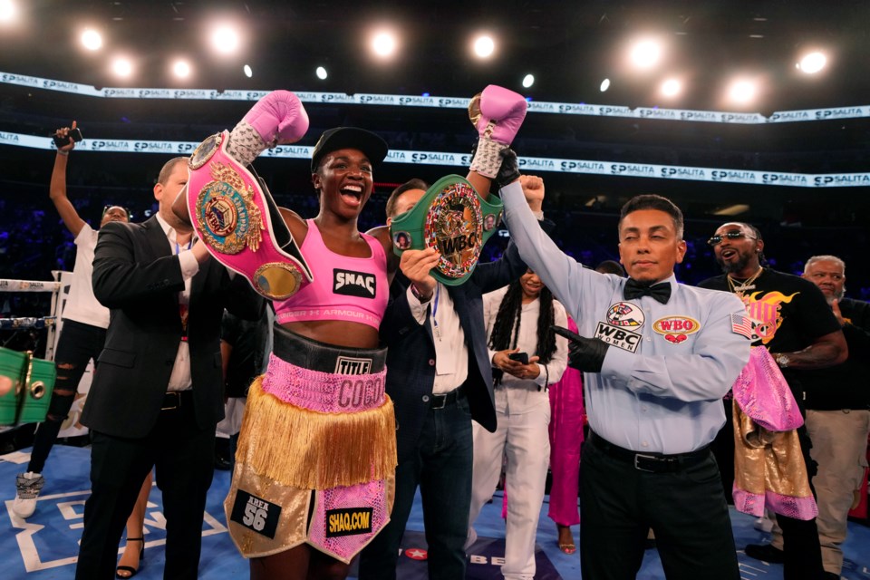 FILE - Middleweight champion Claressa Shields celebrates after defeating reigning WBC women's heavyweight boxing champion Vanessa Lepage-Joanisse of Quebec during a fight, Saturday, July 27, 2024, in Detroit. (AP Photo/Carlos Osorio, File)