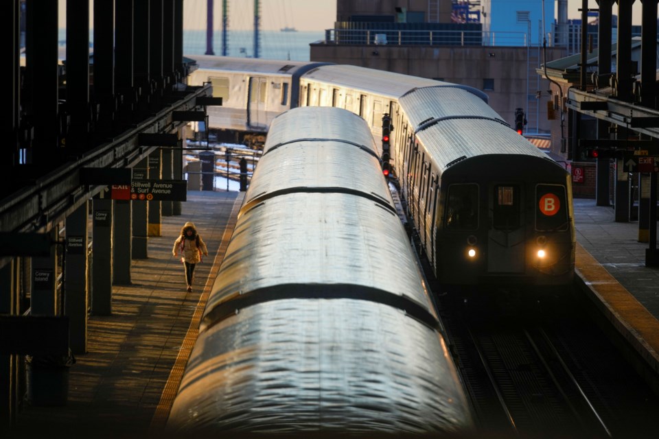 Trains arrive and depart from a subway station in the Coney Island section of New York, Thursday, Jan. 23, 2025. (AP Photo/Seth Wenig)