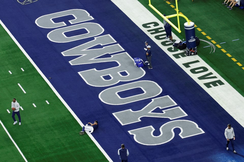 FILE - The word's "Choose Love" are displayed in the end zone at AT&T Stadium before a NFL football game between the Washington Commanders and the Dallas Cowboys on Sunday, Jan. 5, 2025, in Arlington, Texas. (AP Photo/Matt Patterson, File)