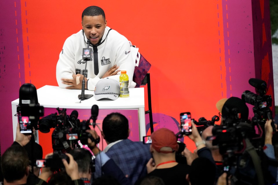 Philadelphia Eagles running back Saquon Barkley participates during Super Bowl 59 Opening Night, Monday, Feb. 3, 2025, in New Orleans, ahead of the NFL football game between the Philadelphia Eagles and the Kansas City Chiefs Sunday. (AP Photo/Godofredo A. Vásquez)