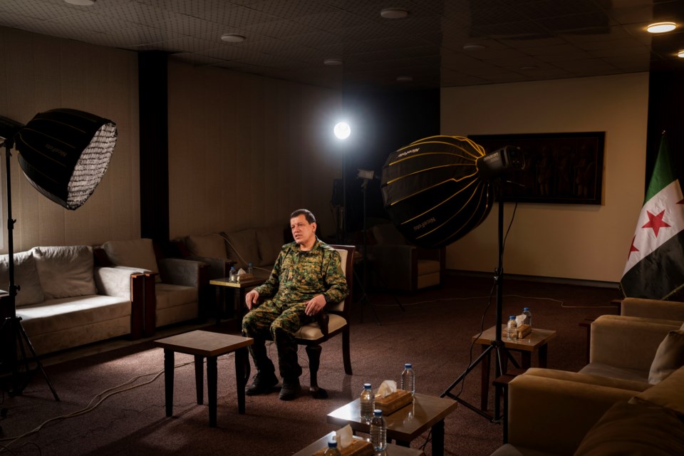 Mazloum Abdi, commander-in-chief of the Syrian Democratic Forces (SDF) talks to The Associated Press during an interview in the northeastern Syrian city of Hassakeh, Sunday, Feb. 2, 2025. (AP Photo/Bernat Armangue)