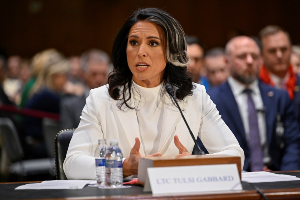 Tulsi Gabbard, President Donald Trump's choice to be the Director of National Intelligence, arrives to appear before the Senate Intelligence Committee for her confirmation hearing on Capitol Hill Thursday, Jan. 30, 2025, in Washington. (AP Photo/John McDonnell)