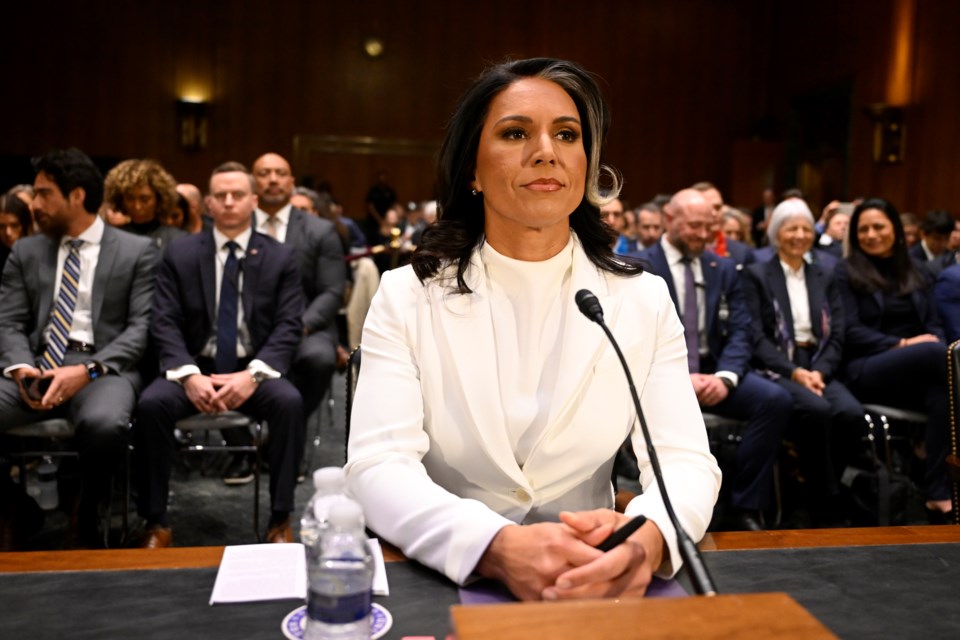 Tulsi Gabbard, President Donald Trump's choice to be the Director of National Intelligence, arrives to appear before the Senate Intelligence Committee for her confirmation hearing on Capitol Hill Thursday, Jan. 30, 2025, in Washington. (AP Photo/John McDonnell)