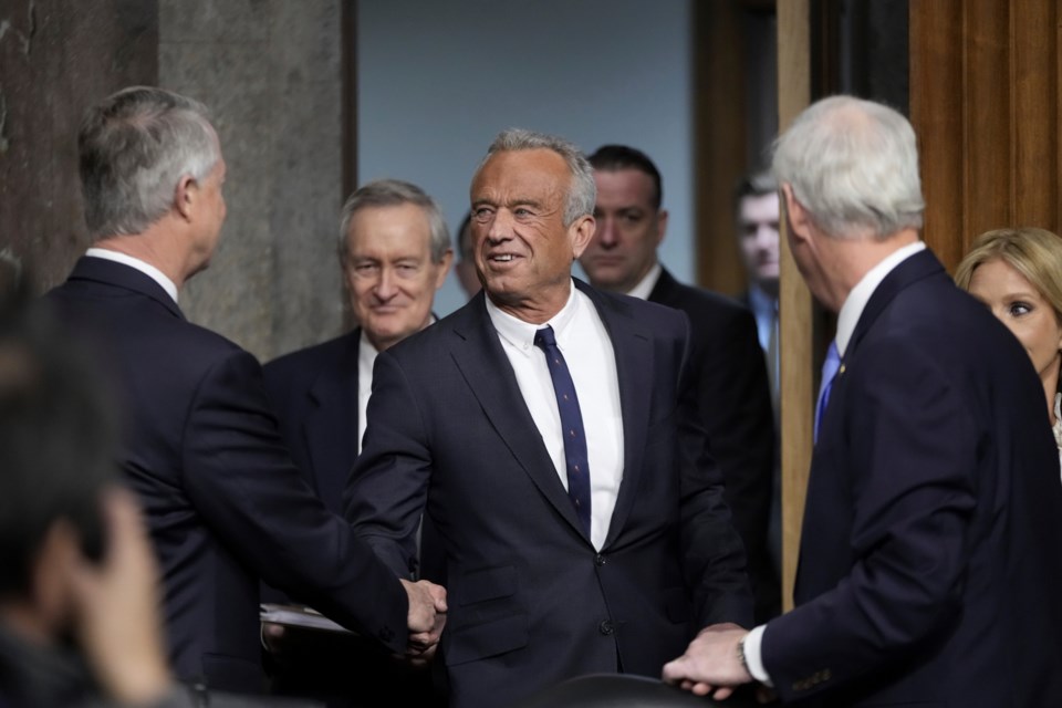 Robert F. Kennedy Jr., President Donald Trump's choice to be Secretary of Health and Human Services, arrives to appear before the Senate Finance Committee for his confirmation hearing, at the Capitol in Washington, Wednesday, Jan. 29, 2025. (AP Photo/Ben Curtis)