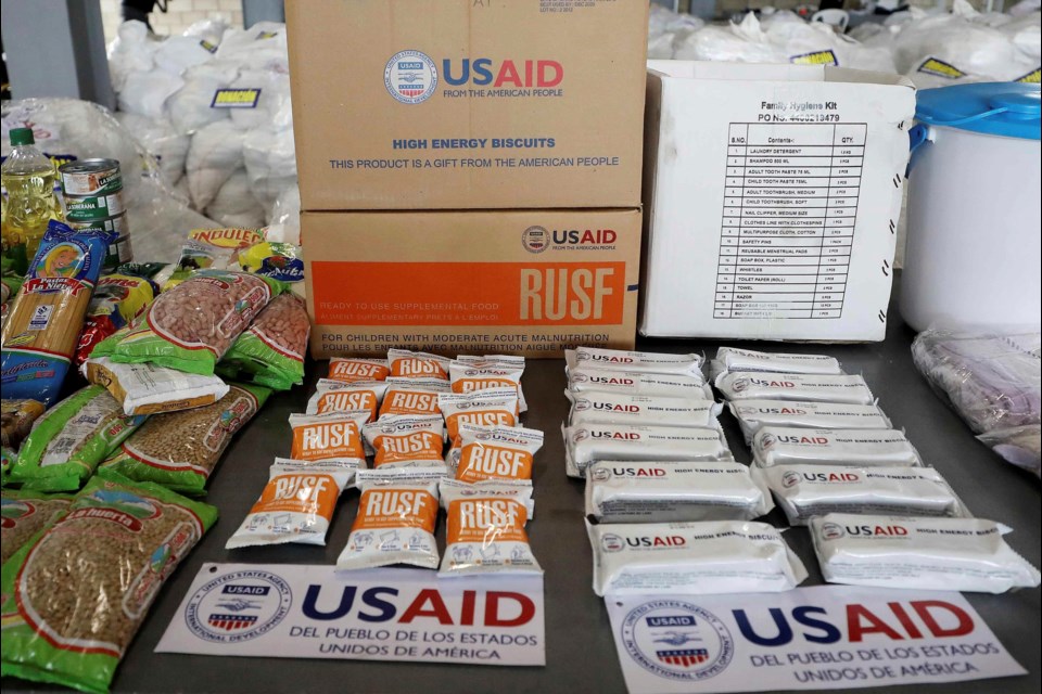 FILE - USAID humanitarian aid destined for Venezuela is displayed for the media at a warehouse next to the Tienditas International Bridge on the outskirts of Cucuta, Colombia, Feb. 19, 2019. (AP Photo/Fernando Vergara, File)