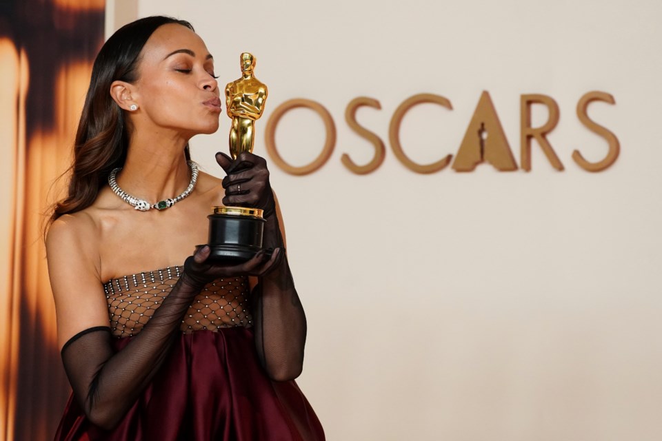 Zoe Saldana, winner of the award for best performance by an actress in a supporting role for "Emilia Perez," poses in the press room at the Oscars on Sunday, March 2, 2025, at the Dolby Theatre in Los Angeles. (Photo by Jordan Strauss/Invision/AP)